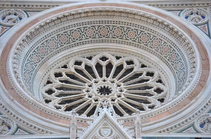 The rose window of the church of Santa Maria del Fiore in The florence cathedral Florence made of white marble of Carrara